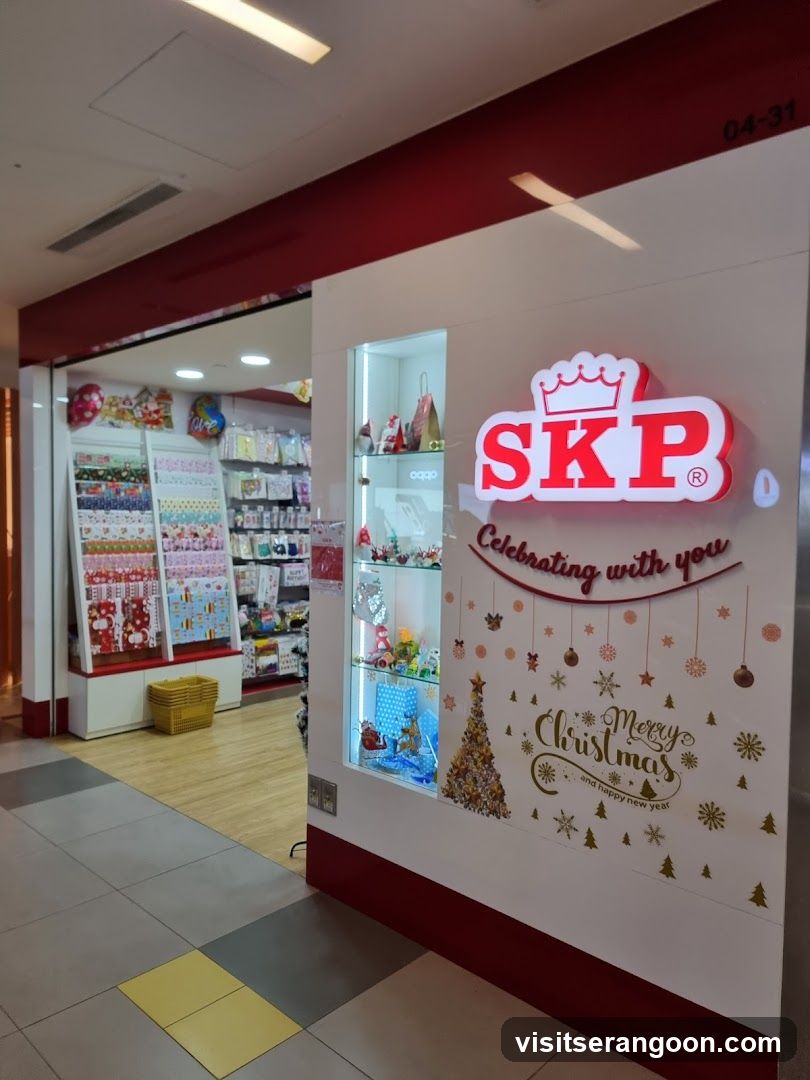 A brightly lit storefront with a large red and white sign reading 'SKP' and 'Celebrating with you'. The facade features a glass display case with merchandise and Christmas-themed wall decals, including a tree and ornaments. The store number 04-31 is visible in the top right corner.