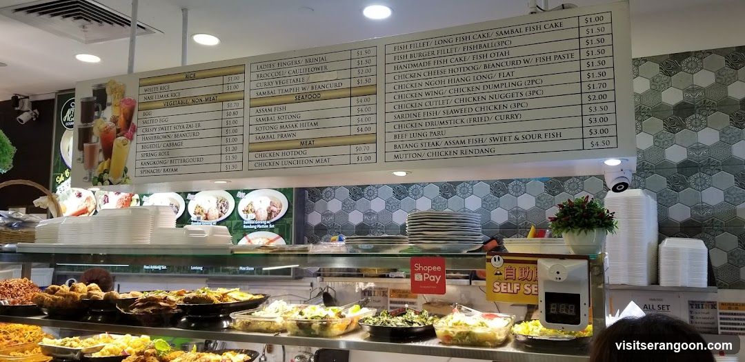 A large white menu board listing various dishes and prices, displayed above a food counter with a self-service payment station.