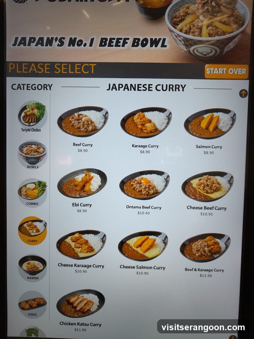 A digital menu board for a Japanese restaurant advertising 'Japan's No. 1 Beef Bowl'. The screen displays a 'Japanese Curry' section with various options including Beef Curry, Karaage Curry, Salmon Curry, Ebi Curry, Ontama Beef Curry, Cheese Beef Curry, Cheese Karaage Curry, Cheese Salmon Curry, Beef & Karaage Curry, and Chicken Katsu Curry, with prices ranging from $8.90 to $11.90. A sidebar lists categories like Bowls, Combo, Curry, Ramen, and Sides.