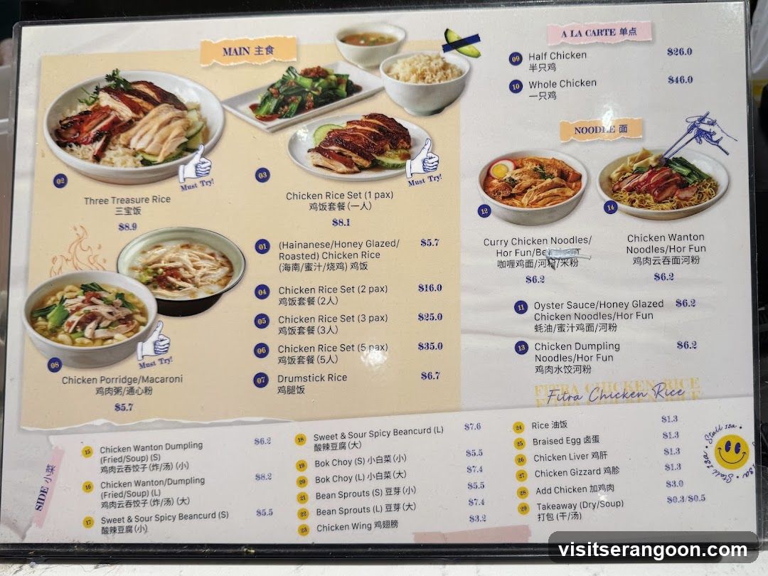 A laminated menu for a chicken rice restaurant, featuring sections for mains, noodles, a la carte items, and sides.