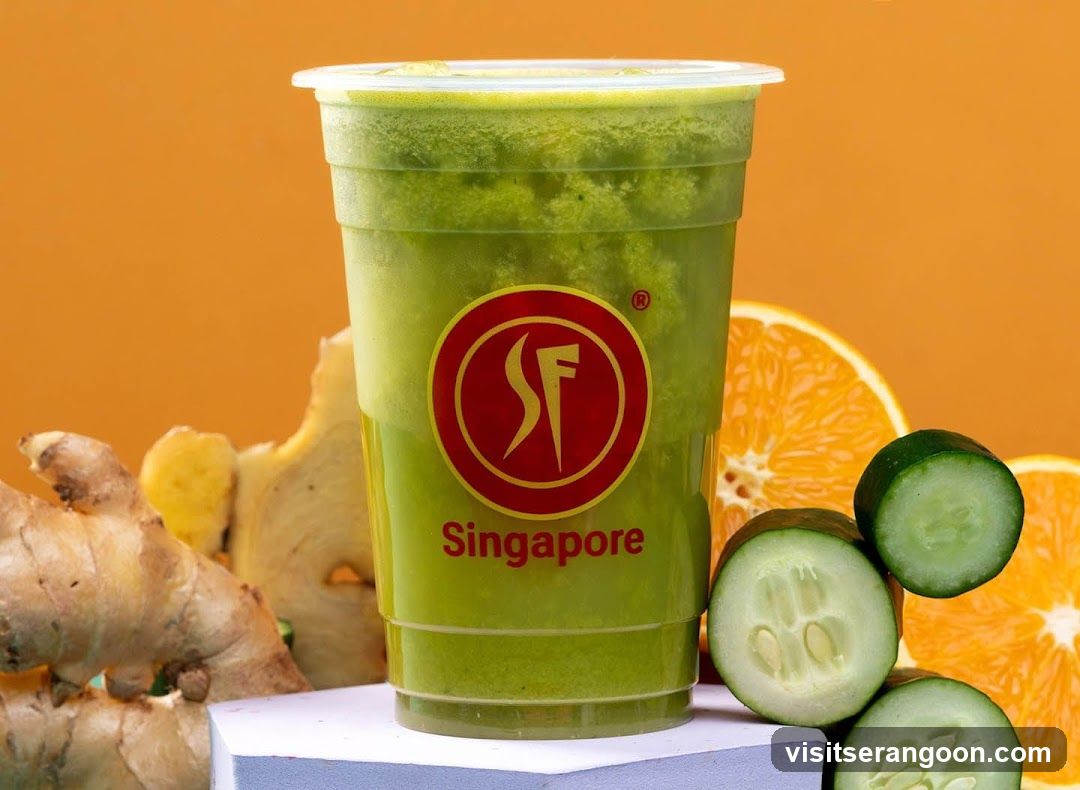 Green beverage in a cup with logo