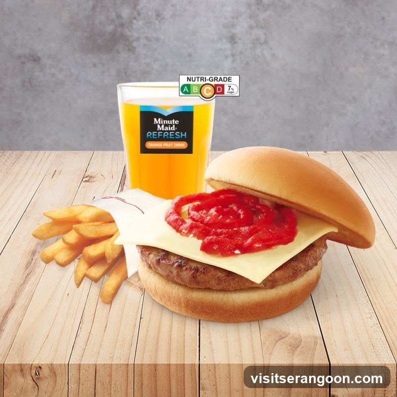Burger, Fries, and Orange Drink