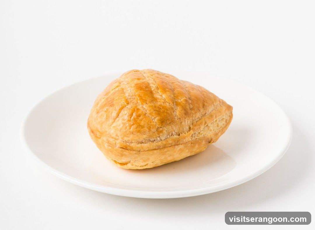 Golden Puff Pastry on a White Plate
