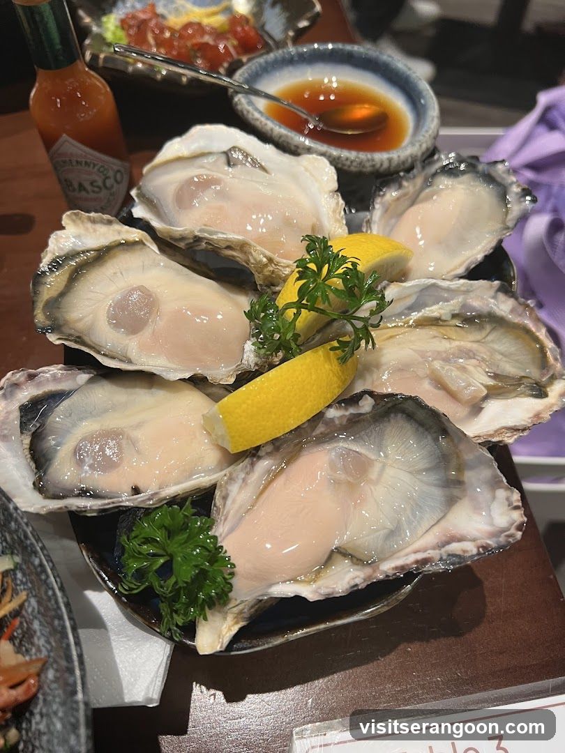 Oysters with Lemon and Sauce