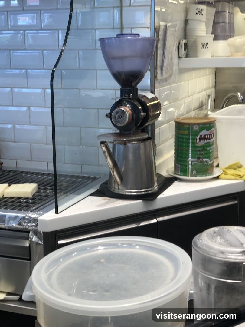 Coffee Grinder and Milo Tin