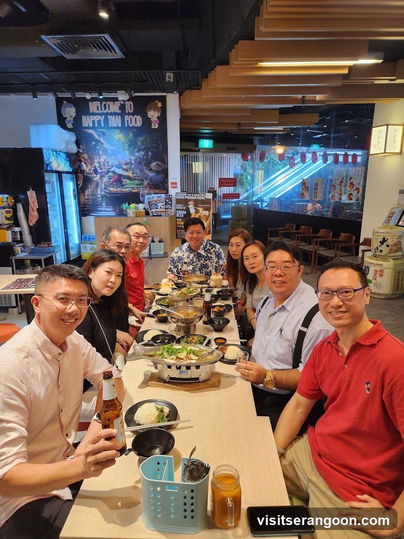 Group enjoying a meal at a Thai restaurant