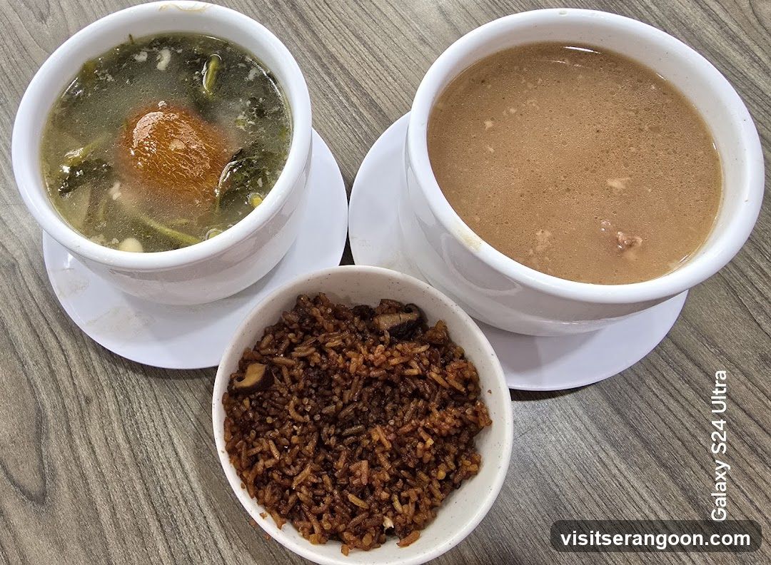 Two bowls of soup and a bowl of rice