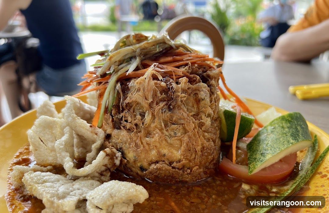 Fried Dish with Salad and Crackers