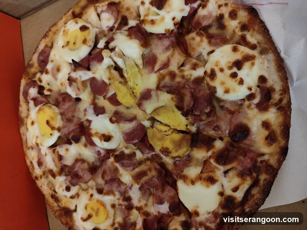 Pizza with Eggs and Sausage