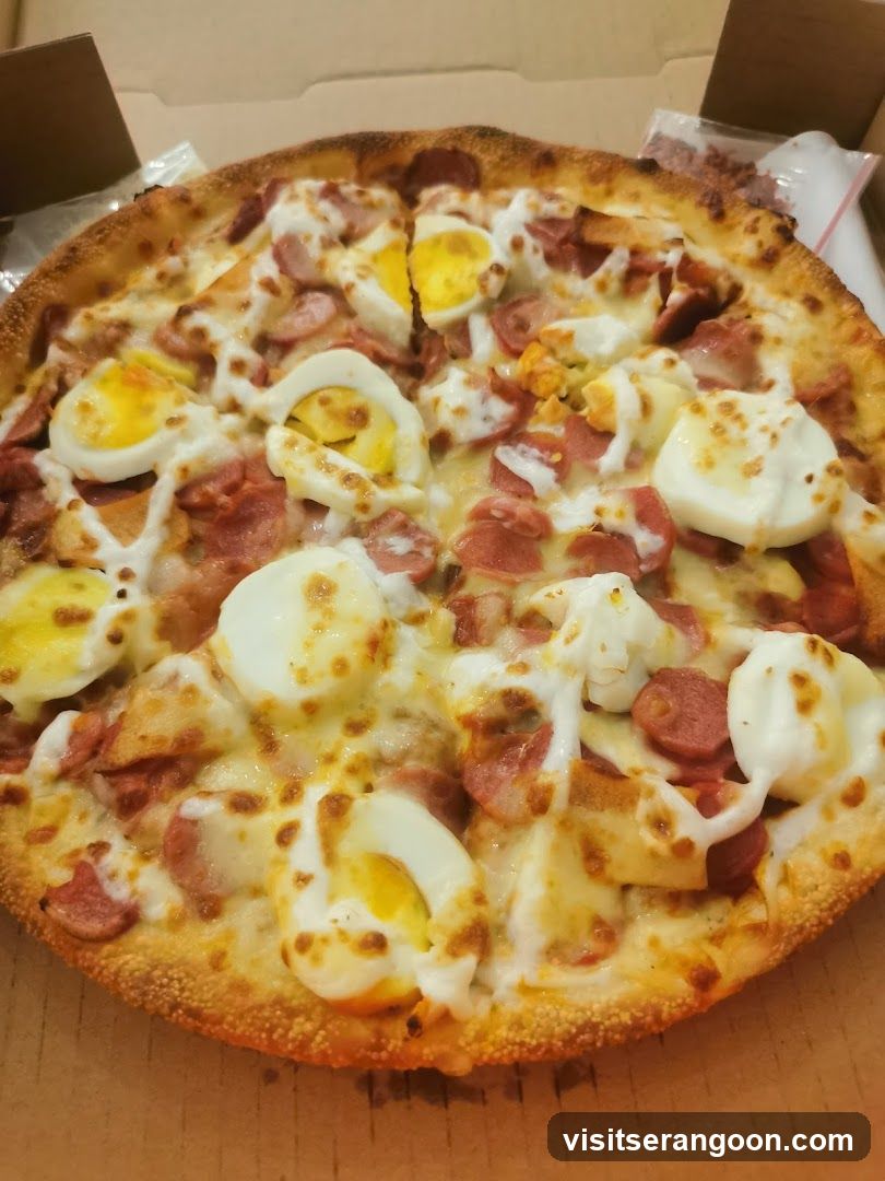 Pizza with Eggs and Sausage