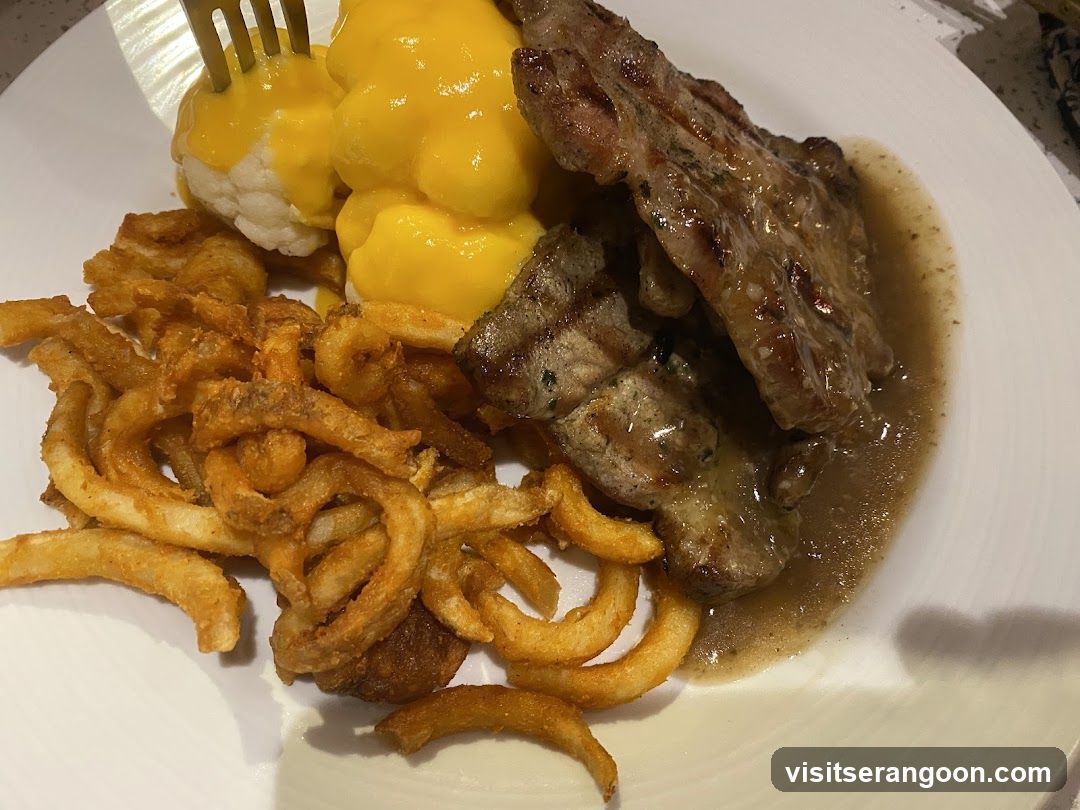 Steak with Curly Fries and Mashed Potatoes