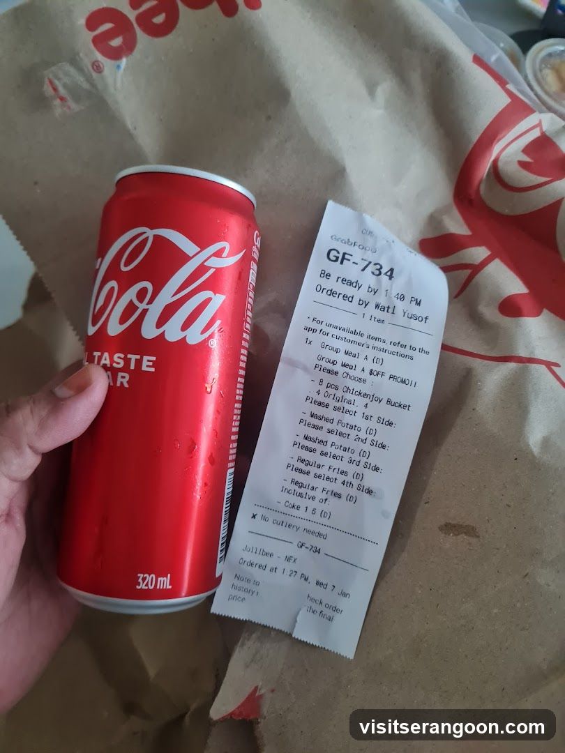 Jollibee Order Receipt and Coca-Cola Can