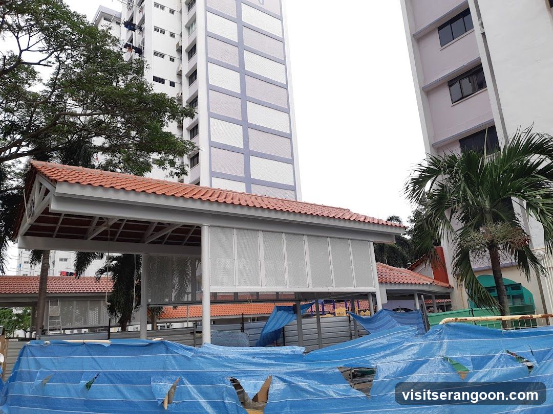 Under construction walkway with blue tarps