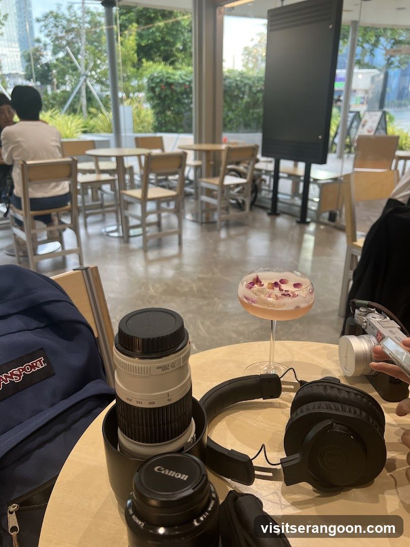 Cafe Interior with Drink and Photography Gear