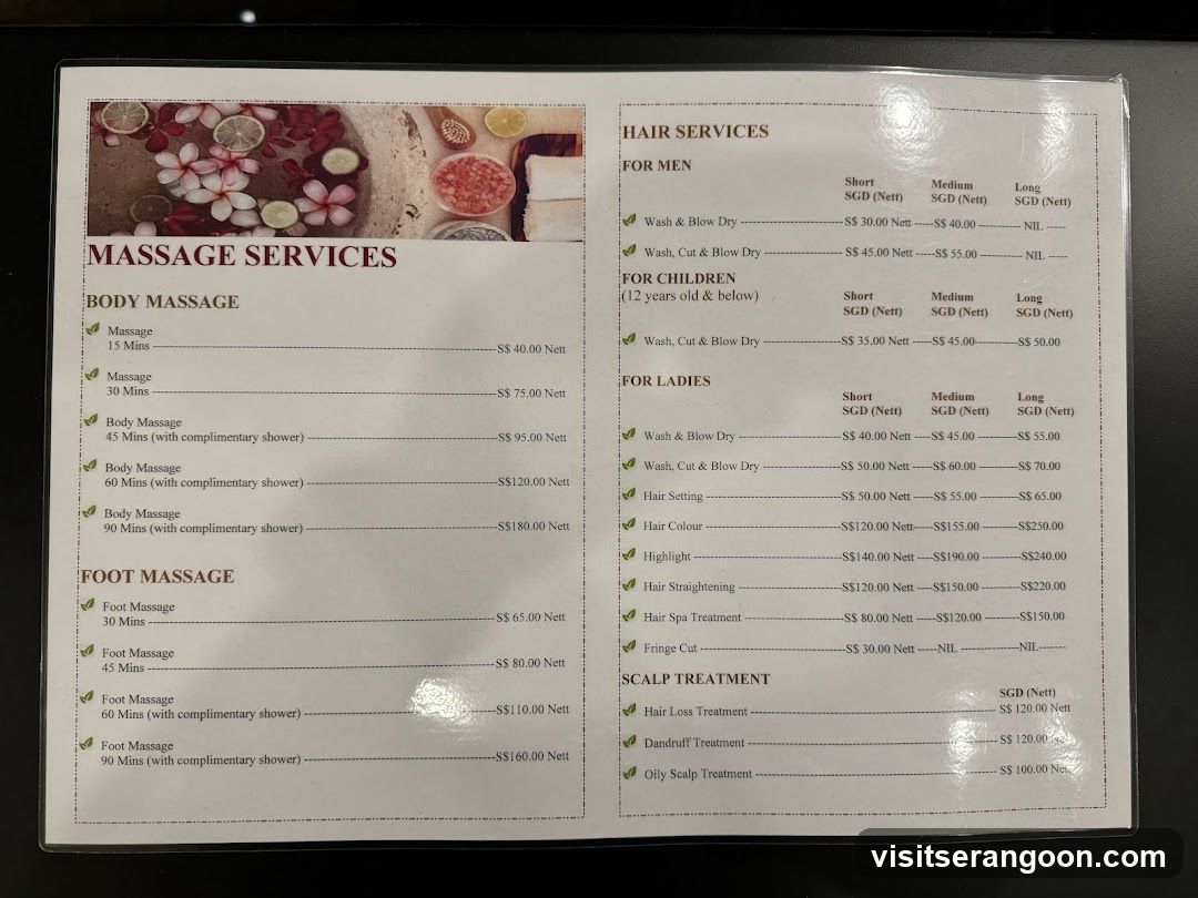 A printed menu listing massage, hair, and scalp services with prices in SGD.