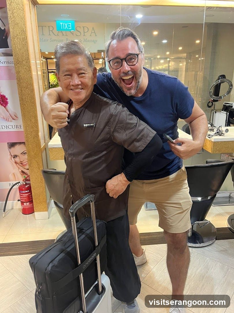 Two men posing in a salon interior