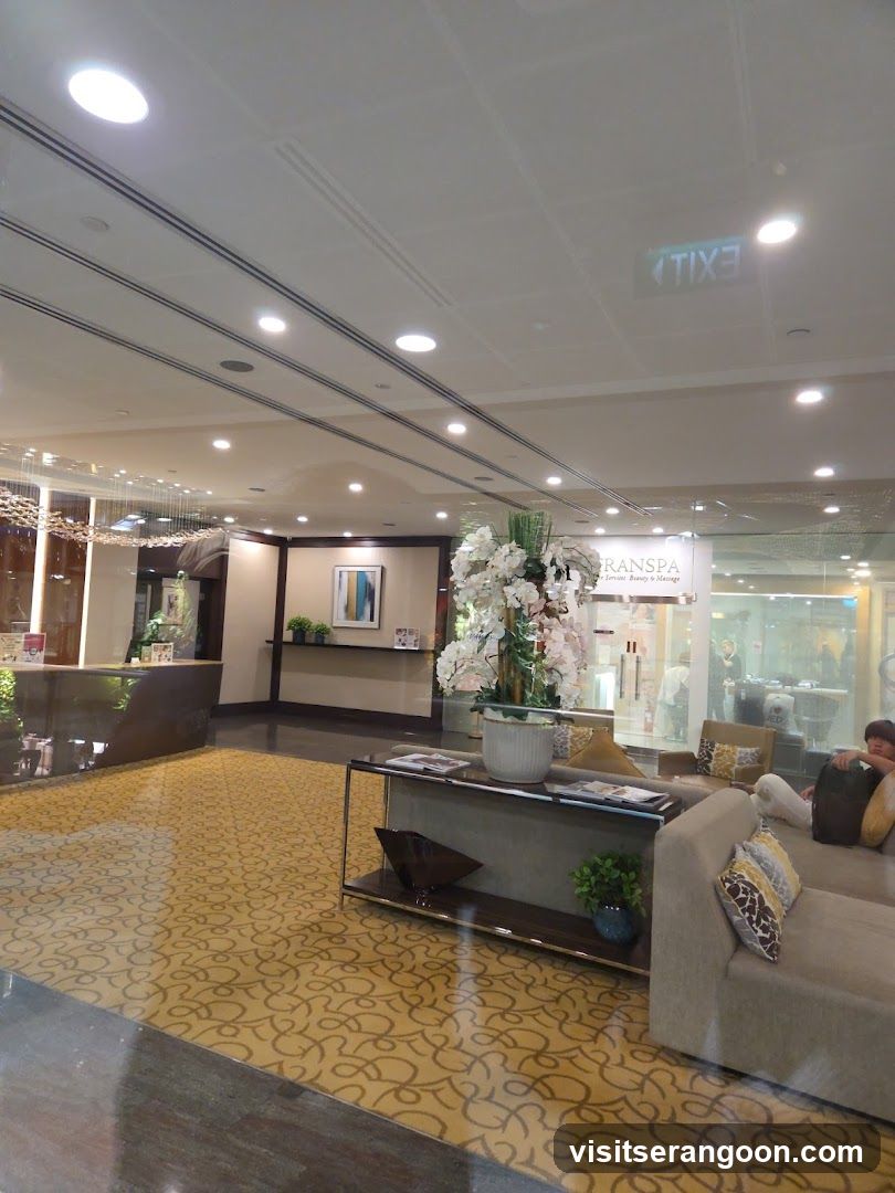 Lobby Interior with Seating Area and Floral Display