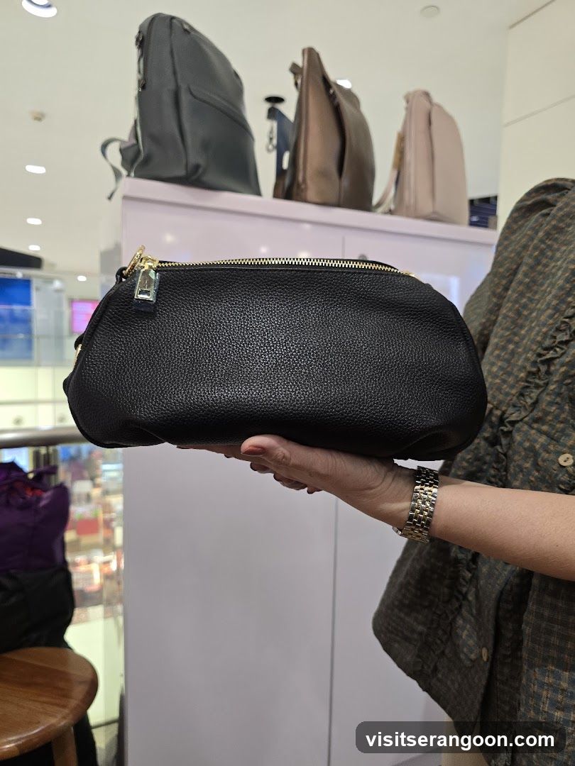 Black handbag in store display