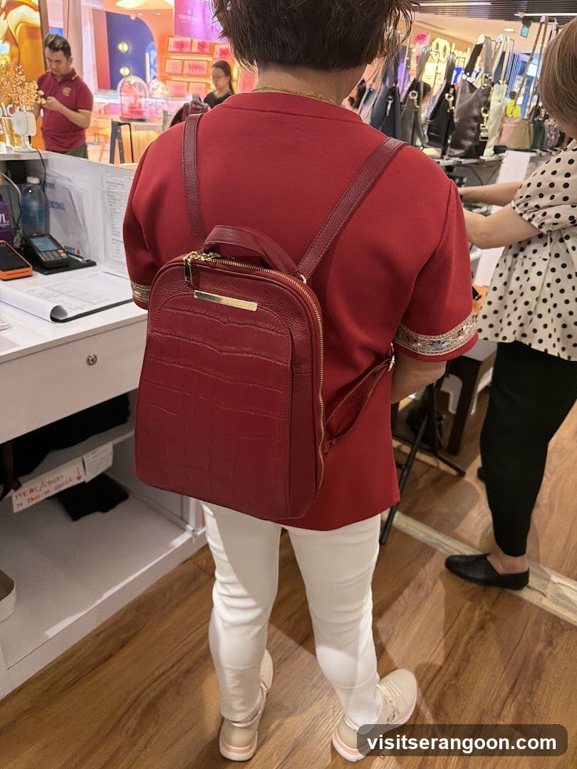 Woman in Red Jacket with Backpack